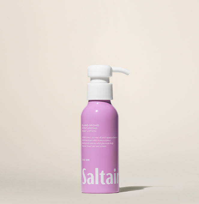 travel size body lotion in island orchid